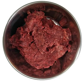 Raw cat food in a bowl